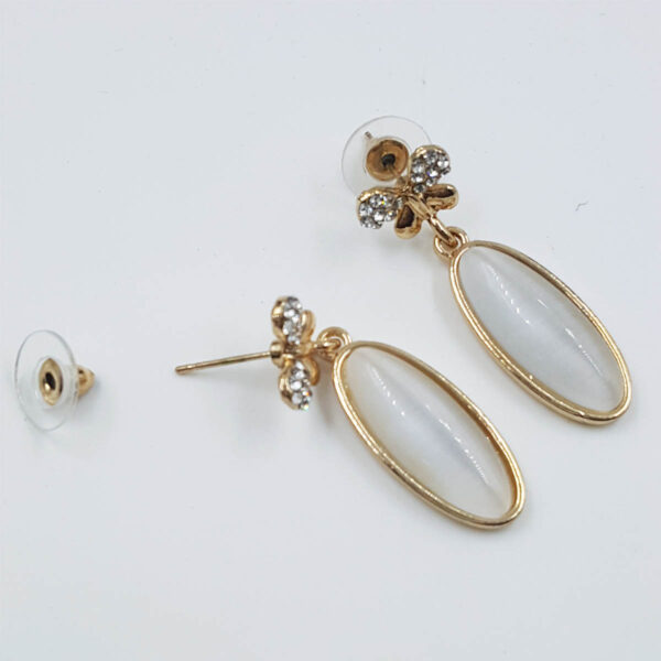 Crystal Bow and White Oval Drop Earrings