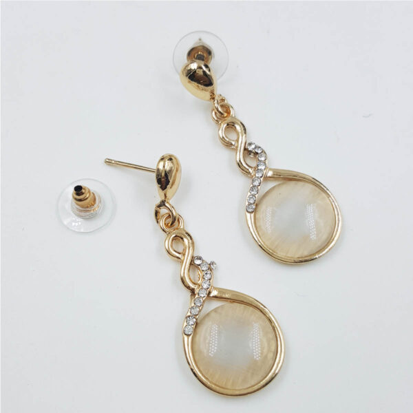 Elegant Infinity Drop Earrings with Cream Stone