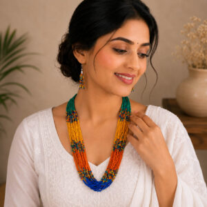 Multicolor layered beaded necklace set with matching tassel earrings featuring teal green, yellow, orange and blue seed beads for women