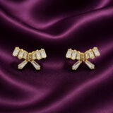 Gold-tone fan stud earrings with baguette-cut clear stones and elegant drop details from Miraya Creations.
